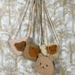 Kindertasje Boucle